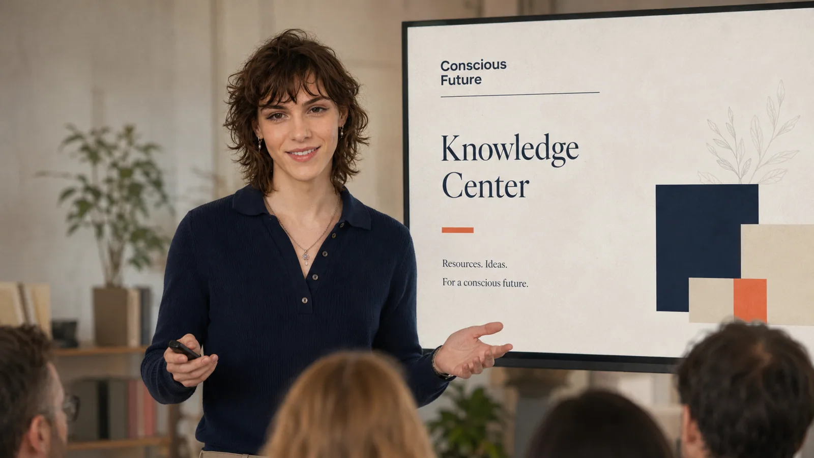 A presenter introducing the Knowledge Centre to an audience
